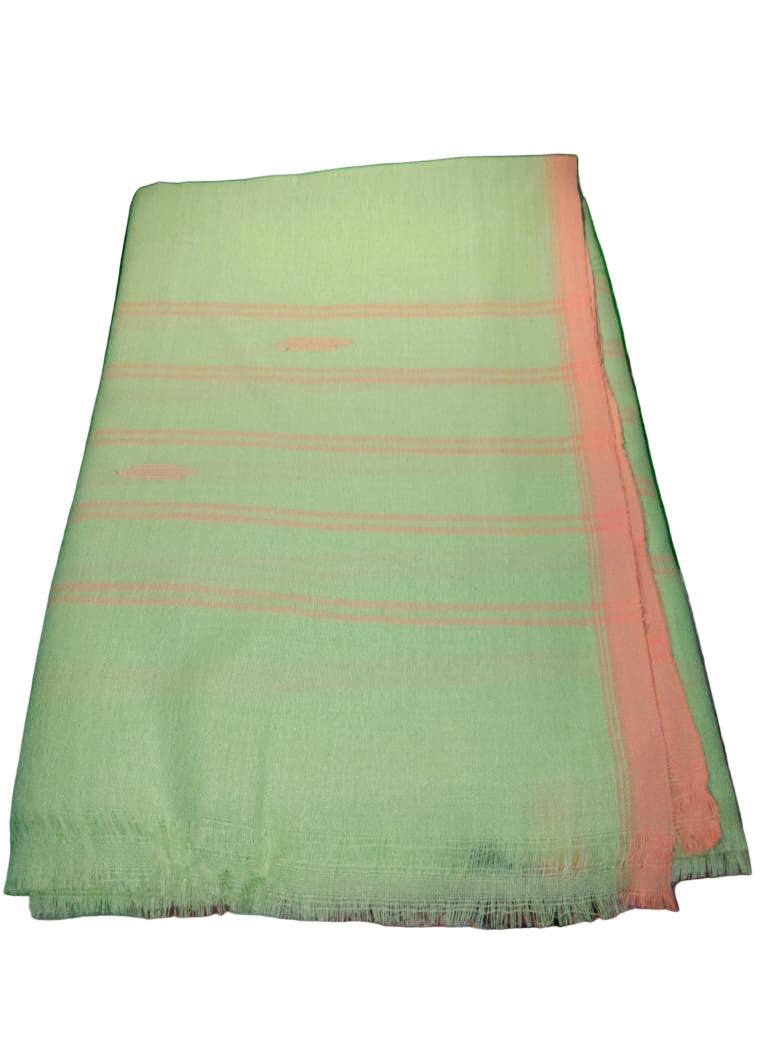 Light green fabric with pink border on a green surface