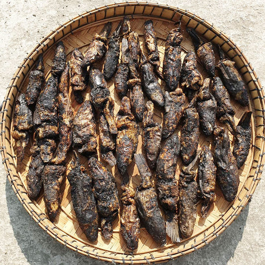 Meitei Ngamu smoked dry fish traditional Manipuri dried smoked fish on bamboo tray