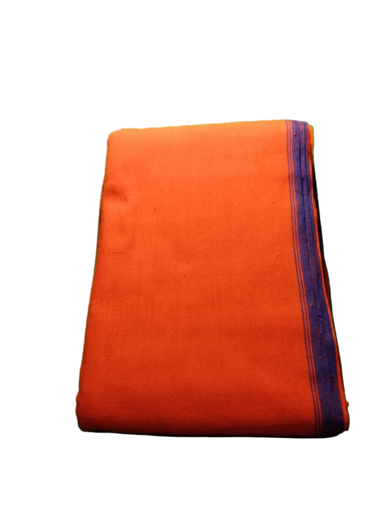 Orange fabric with purple border on a green textured surface