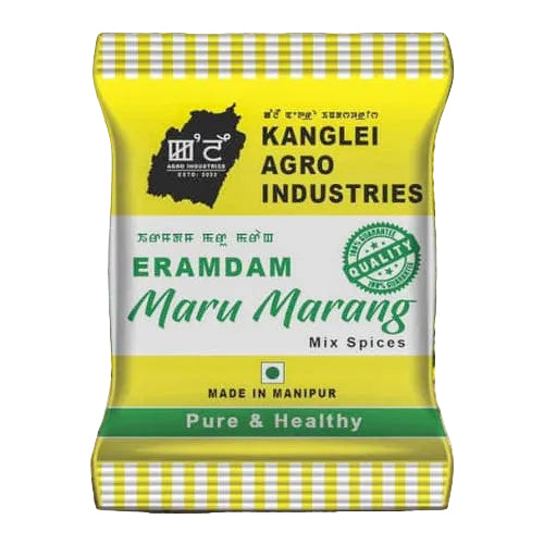 Kanglei Agro Industries spice mix package with a yellow and green design on a wooden surface.