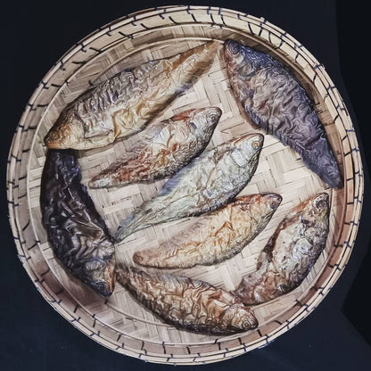 Ngapai smoked dry fish traditional Manipuri smoked whole fish on bamboo tray