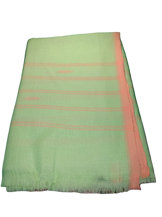 Light green fabric with pink border on a green surface