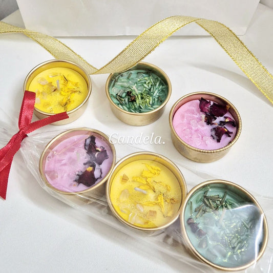 Candela ritual tealight candles with botanical decorations in yellow, pink and green wax