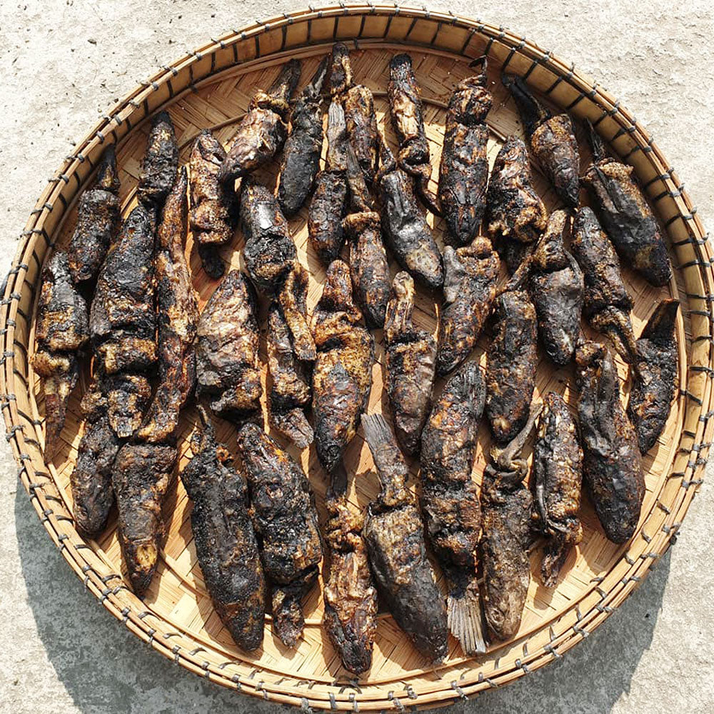 Meitei Ngamu smoked dry fish traditional Manipuri dried smoked fish on bamboo tray