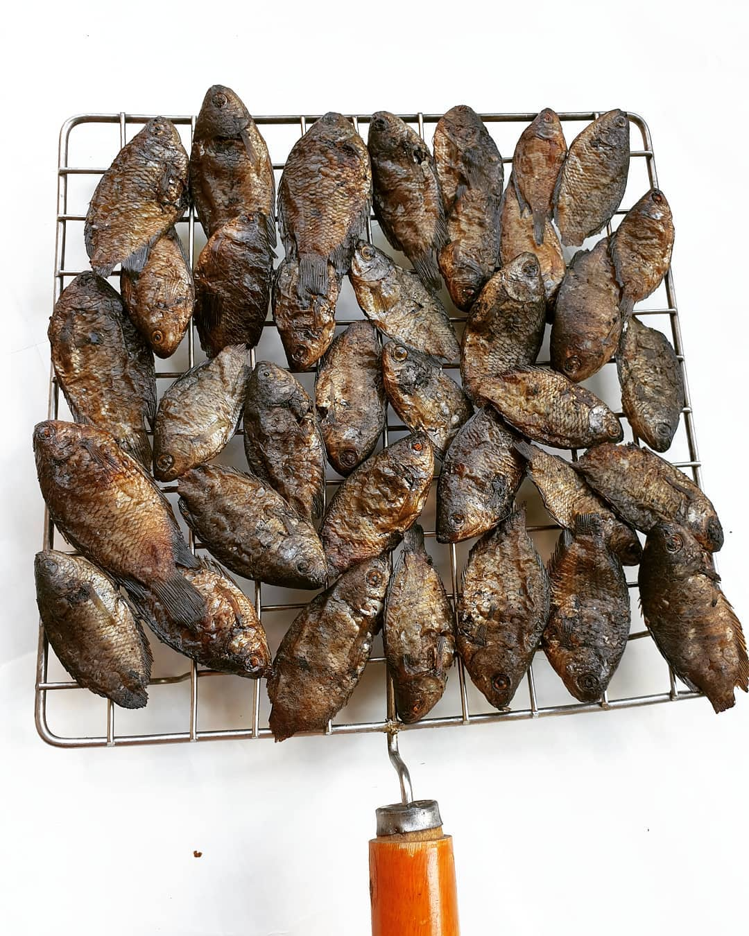Ngapemma smoked dry fish Colisa fish Manipuri smoked dried fish on rack