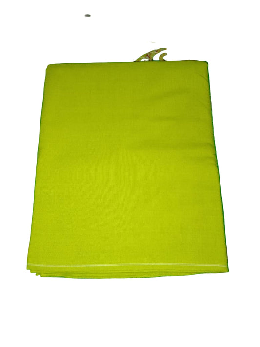 Yellow fabric on a green textured surface