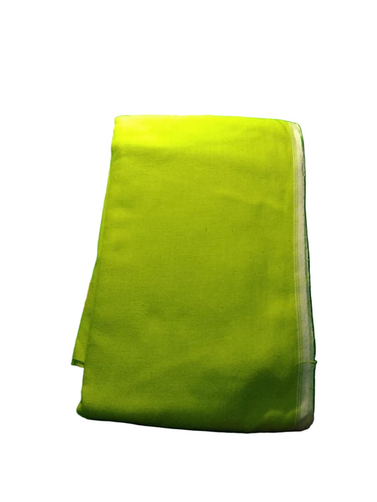 Green towel on a textured green surface