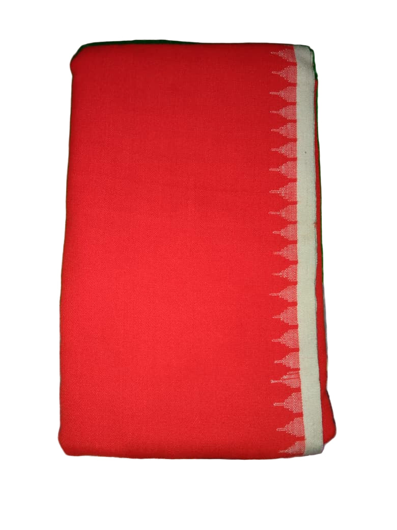 Red fabric with a white border on a green surface